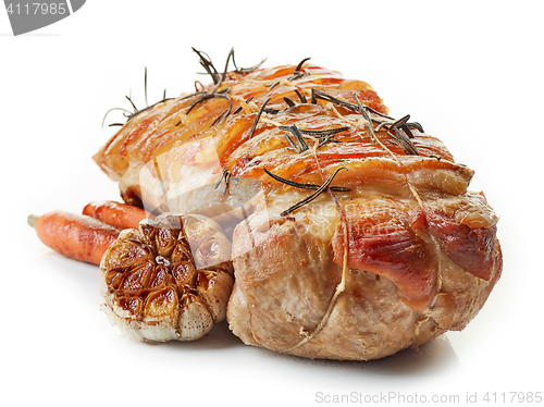 Image of roasted pork and vegetables on white background