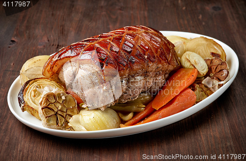 Image of plate of roasted pork and vegetables