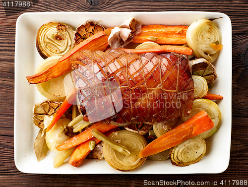 Image of plate of roasted pork and vegetables
