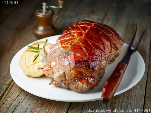 Image of roasted pork on white plate