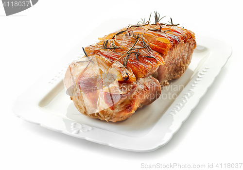 Image of roasted pork on white plate