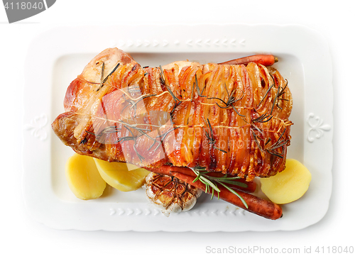 Image of roasted pork on white plate