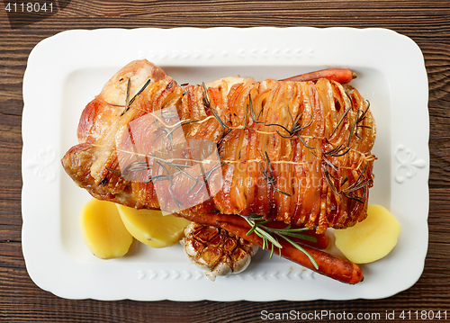 Image of roasted pork on white plate