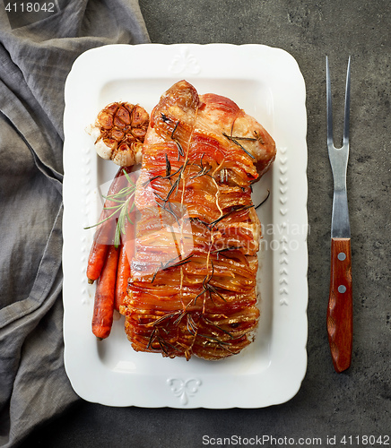 Image of roasted pork on white plate