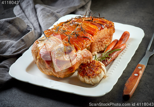 Image of roasted pork on white plate