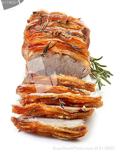 Image of roasted sliced pork and rosemary