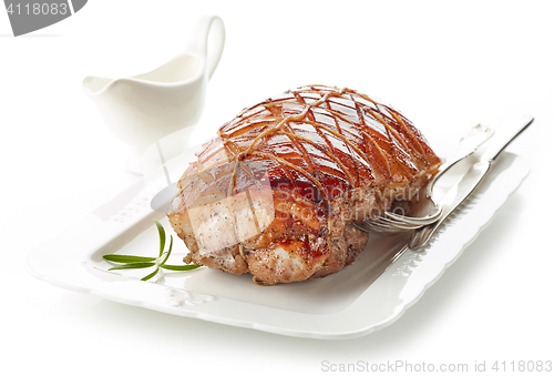 Image of roasted pork on white plate