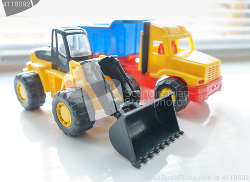 Image of Toy Wheel Loader and Toy Dump Truck