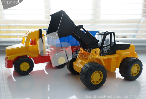 Image of Toy Wheel Loader and Toy Dump Truck