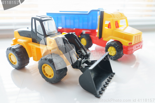 Image of Toy Wheel Loader and Toy Dump Truck