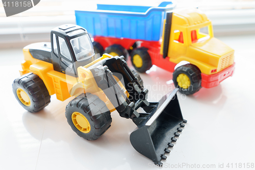 Image of Toy Wheel Loader and Toy Dump Truck