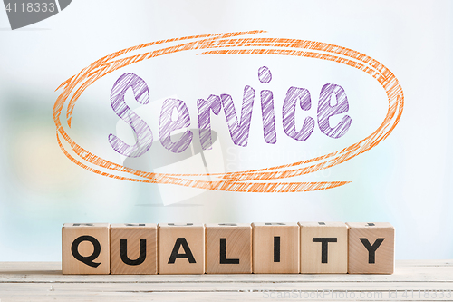 Image of Service quality sign with wooden blocks