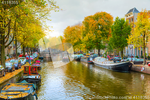 Image of Amsterdam city view with canals and bridges