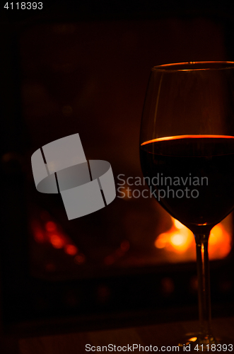 Image of Romantic atmosphere with a glass of red wine