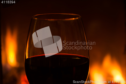 Image of Glowing glass of red wine detail