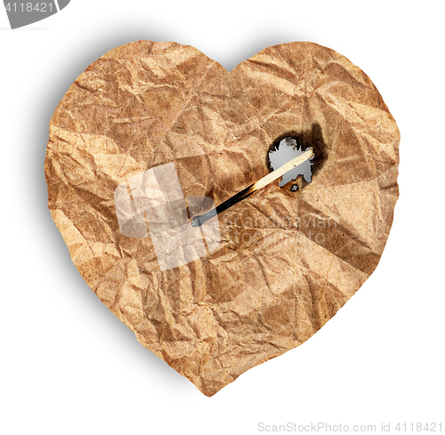 Image of Crumpled paper heart burns match