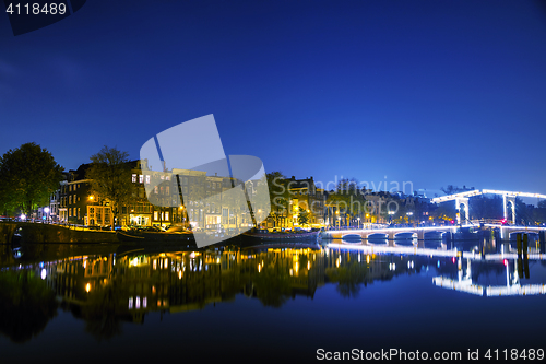 Image of Amsterdam city view with canals and bridges