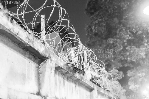 Image of Wall with barbed wire