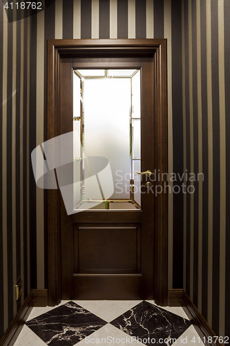 Image of door with stained glass