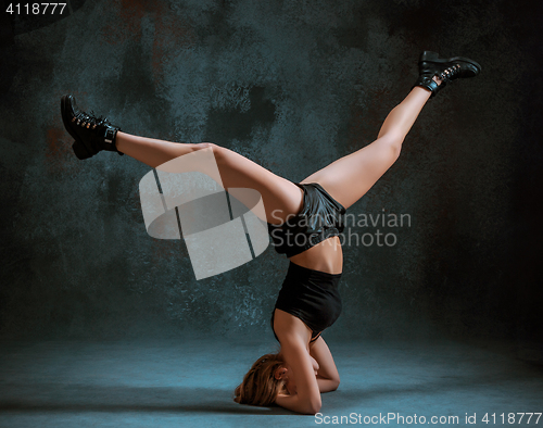 Image of Attractive girl dancing twerk in the studio