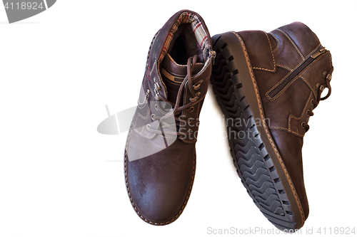 Image of Mens shoes for winter on a white background.