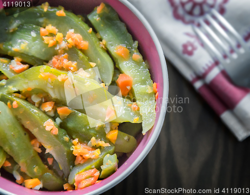 Image of Marinated cucumbers with carrots and spices.