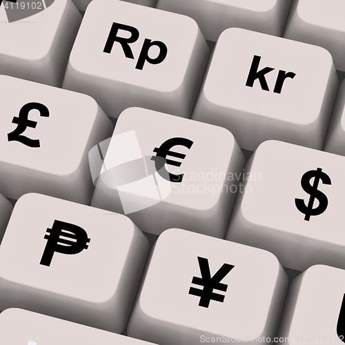 Image of Currency Symbols On Computer Keys Showing Exchange Rates