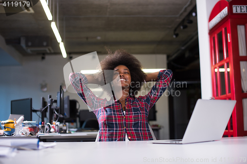 Image of portrait of a young successful African-American woman in modern 