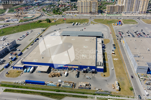 Image of Road construction and Metro shopping center. Tyumen