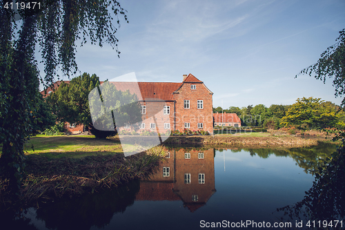 Image of Red castle near a lake