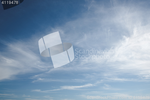Image of Blue sky with soft white clouds