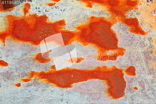 Image of orange rust on metal surface