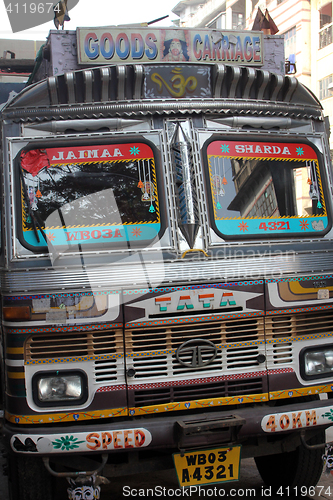 Image of Old rusty truck waits for a new cargo nearby Kolkata Flower Market