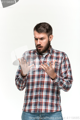 Image of Man is looking scared. Over white background