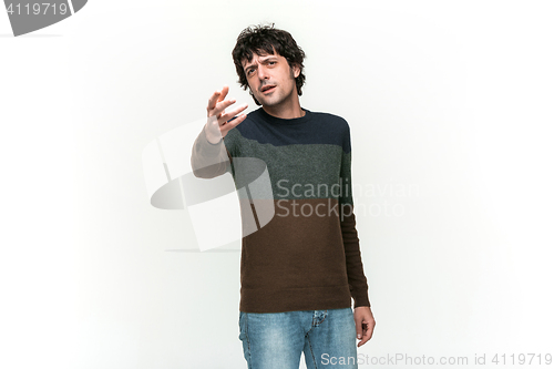 Image of The young man looking at camera