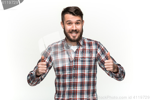 Image of The young man looking at camera