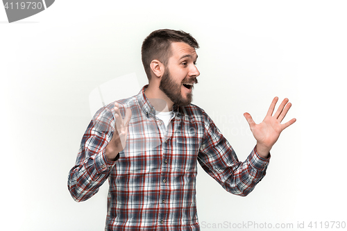 Image of The young man looking on right