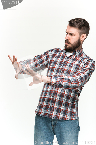 Image of Man is looking scared. Over white background