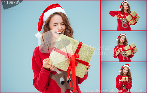 Image of Girl dressed in santa hat with a Christmas gifts