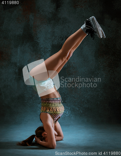 Image of Attractive girl dancing twerk in the studio