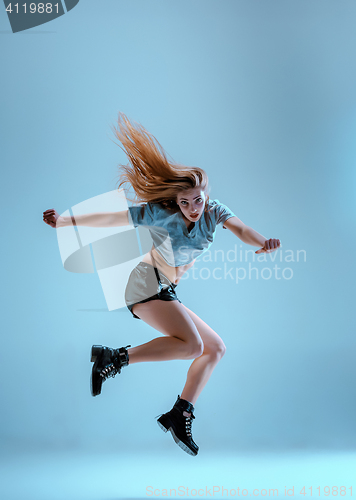 Image of Attractive girl dancing twerk in the studio