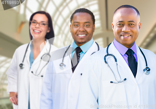 Image of Female and Male Caucasian and African American Doctors in Hospit