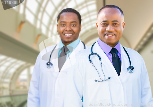 Image of Two African American Male Doctors Inside Hospital Office