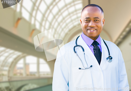 Image of African American Male Doctor Inside Hospital Office