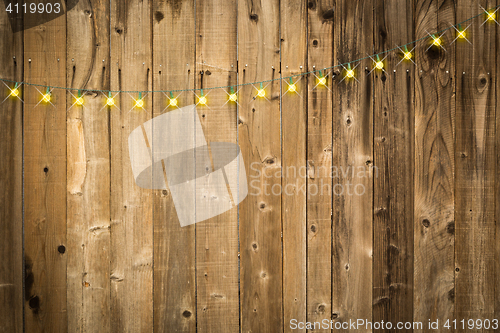 Image of Lustrous Wooden Background with String of Lights