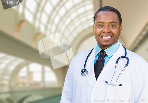 Image of African American Male Doctor Inside Hospital Office