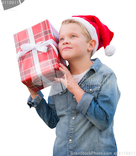 Image of Young Boy Wearing Santa Hat Holding Christmas Gift