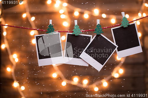 Image of Blank instant photographys with garland