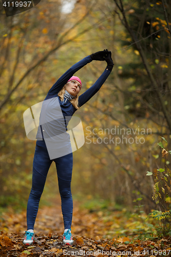 Image of Girl at gym in forest