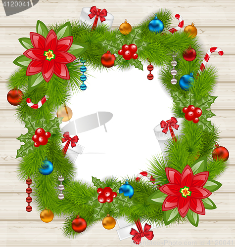 Image of Christmas frame with traditional elements on wooden background